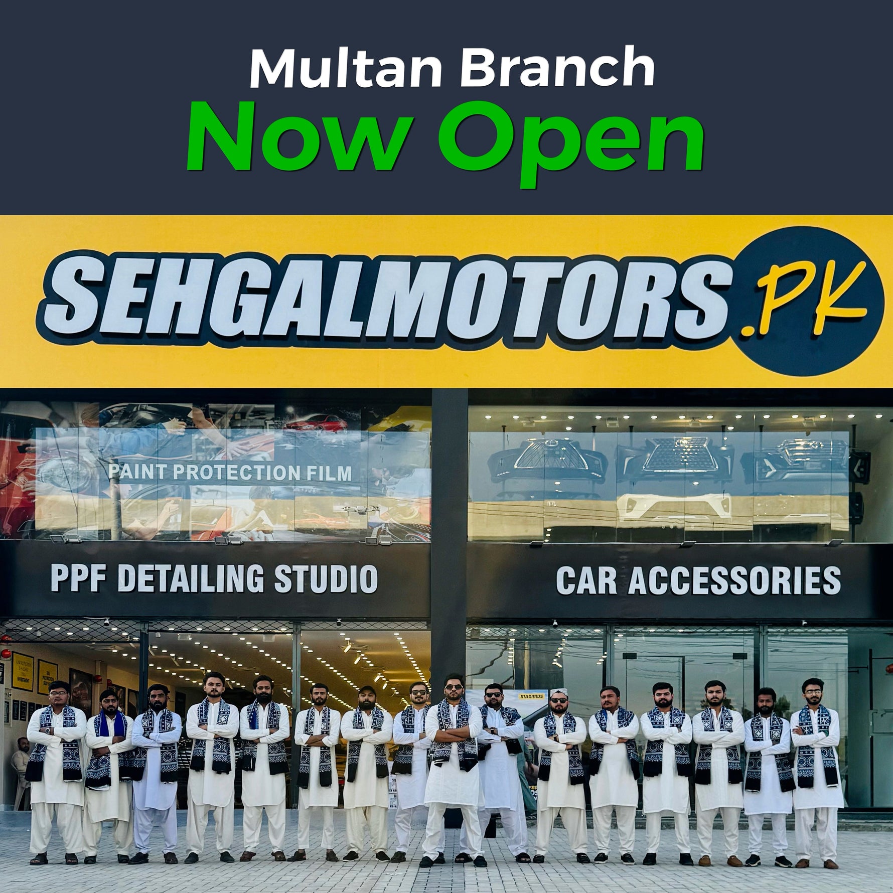 Multan branch now open: Car accessories, PPF detailing studio, team in white uniforms outside store