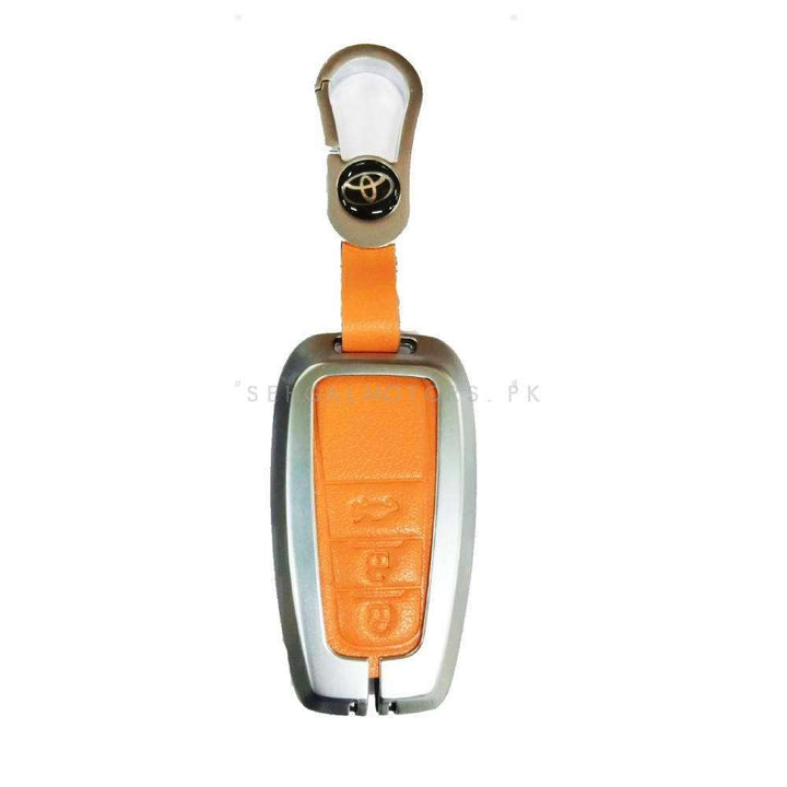 Toyota Hilux Revo/Rocco Leather Design Metal Key Cover Silver with Orange 3 Buttons